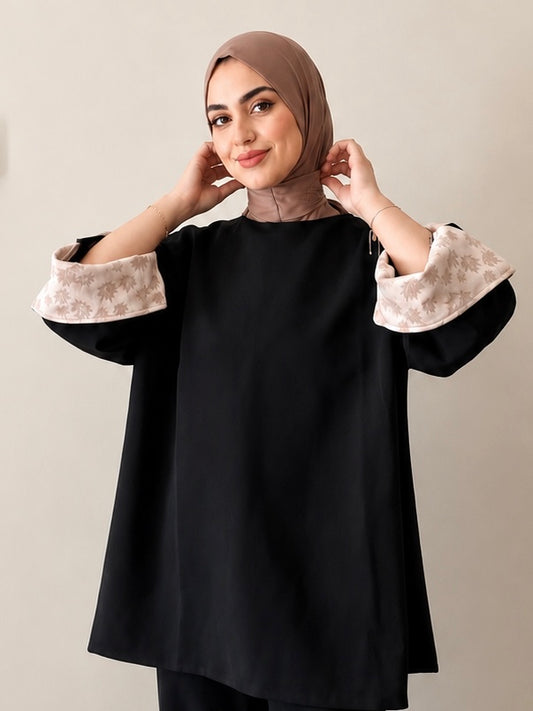 pull oversize avec détails sur les manches